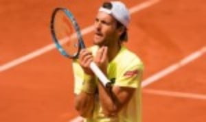 Joao SousaÈs bid to become the first Portuguese winner of the Estoril Open remains on track after a topsy-turvy 6-3 1-6 6-0 win over Kyle Edmund